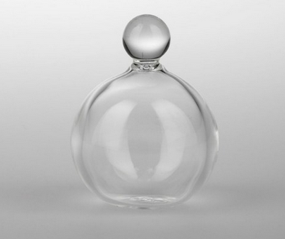 Glass globe top with small globe handle, symbolic of Earth and Moon